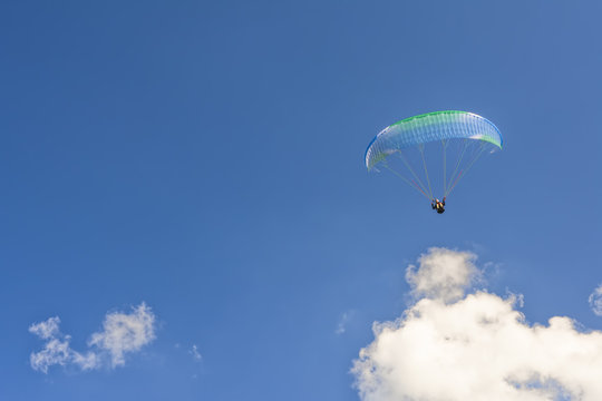 Skydiver in the clouds