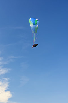 Skydiver in the clouds