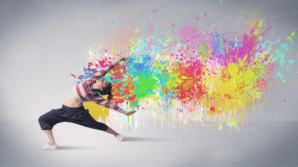 Young colorful street dancer with paint splash