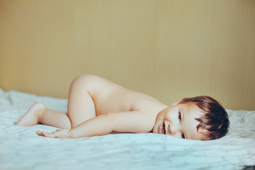 Fototapeta premium Adorable baby in bedroom