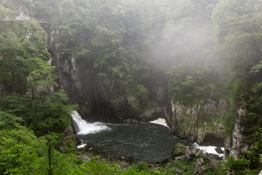 Waterfall falls into the mountain river Škocjanske jame national park UNESCO world heritage 