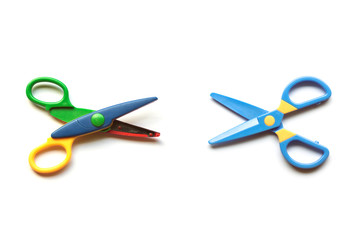 Scissors vs. Scissors on white background