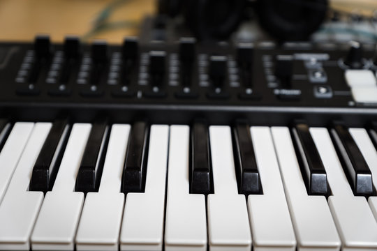 MIDI keyboard synthesizer piano keys closeup for electronic music production / recording