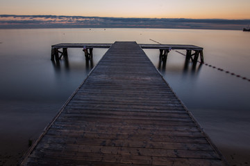 Obraz premium Anazing sunrise over the sea. Pier in Sopot.