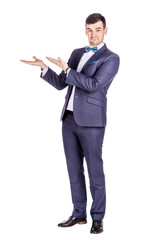 man presenting or showing something your text or product. human emotion expression and lifestyle concept. image on a white studio background.