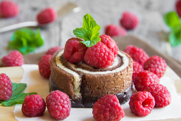 Chocolate cake with fresh raspberries and mint