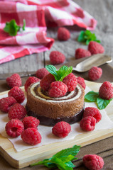 Chocolate cake with fresh raspberries and mint