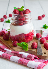Creamy dessert with fresh raspberries