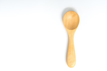 Wooden spoon on the white screen isolated