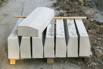 The repair of the road. Pictures of repairing of pedestrian sidewalk. Setting the border