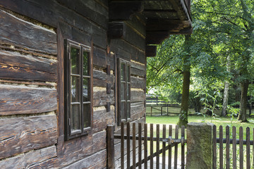 Wood with windows and fence.