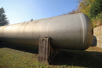 Huge gas storage tanks in an industrial area.