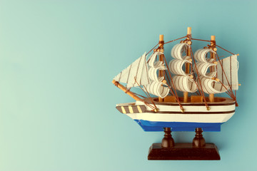 Toy ship on blue backround
