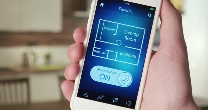 Turning on alarm system in the house using smartphone app