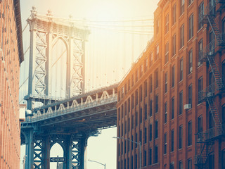 Manhattan bridge and a brick buildings