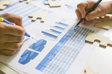 business, people, paperwork, office and technology concept - businessman hands with calculator and...