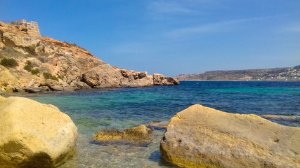 Fototapeta premium mellieha malta beach with rocks