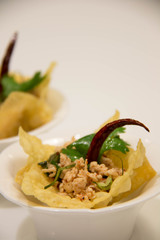 Spicy minced pork salad with dried chili