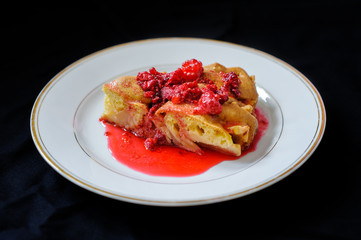 fruit pie with raspberry jam on a dark background