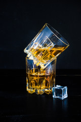 Glacc of cognac with ice and lime