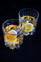 Glacc of cognac with ice and lime