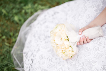 wedding bouquet in bride's hands
