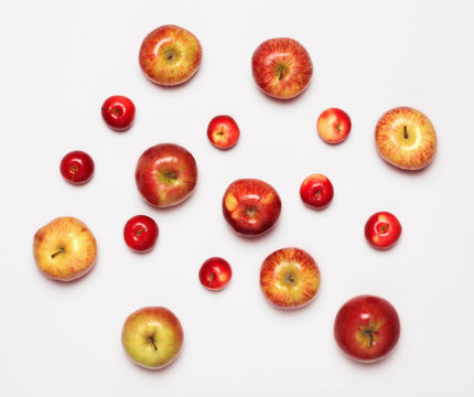 many apples fruits isolated on a white background, flat lay
