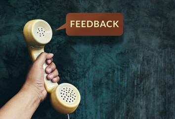 Customer Experience Concept, Hand raising Telephone and Listen Feedback from Client, Vintage Retro...
