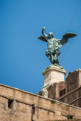 Fototapeta na wymiar Saint Michael statue on the top of Castel Sant Angelo in Rome. Italy.