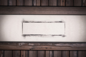white wall with painted frame on wooden background