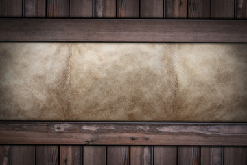 brown leather texture on wooden background .