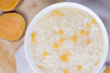 Simple and healthy porridge cooked with sweet potato. For diet and nutrition, healthy eating and lifestyle concepts.