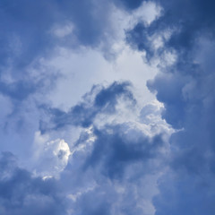 cloudy cover of the sky or weather.