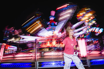 little girl happy in the carousel