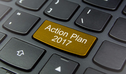 Close-up the Action Plan 2017 button on the keyboard and have Yellow color button isolate black keyboard