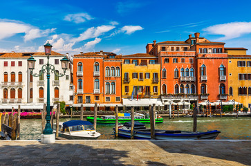 Venice old houses on Grand Canal embankment with street lamp