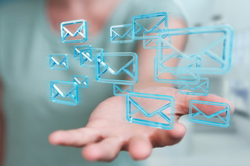 Businesswoman holding and touching floating emails 3D rendering