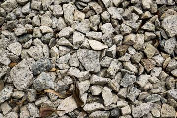 Grey small stones rock background