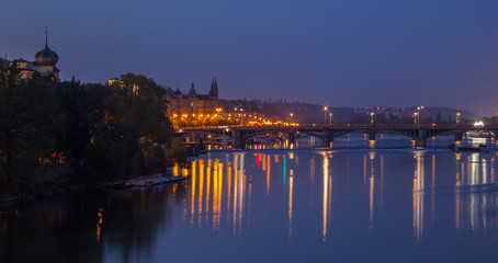 Night city. The historical center of Prague at night.  Vltava River and Old town of Prague, Czech Republic. 