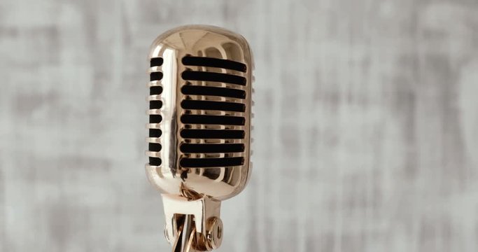 Concert microphone on stage on white background. close up