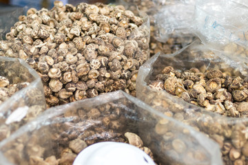 Dried mushroom in plastic bag for sell.
