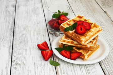 belgian waffles with strawberries and mint
