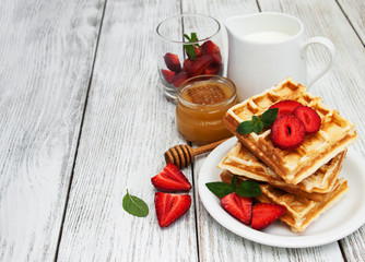 belgian waffles with strawberries and mint