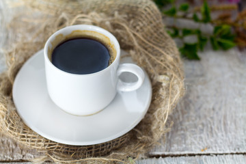 expresso coffee on wooden table background, vintage tone