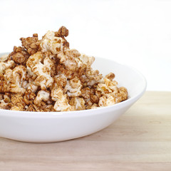 Close - up Caramel chocolate popcorn in white plate