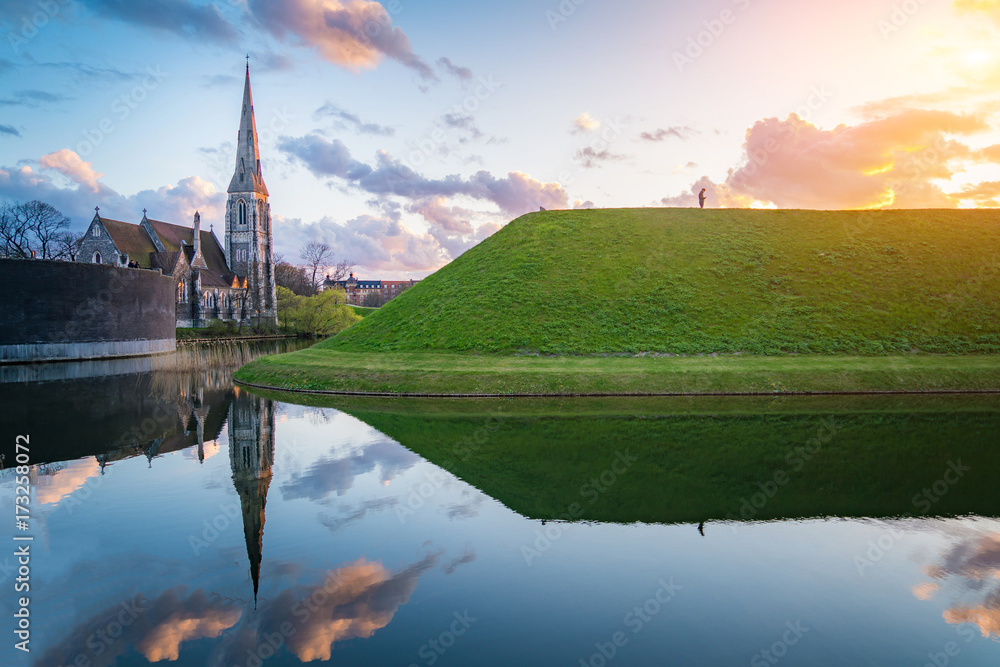 Wall mural beautful sunset st. alban's church (den engelske kirke) and fountain in copenhagen, denmark