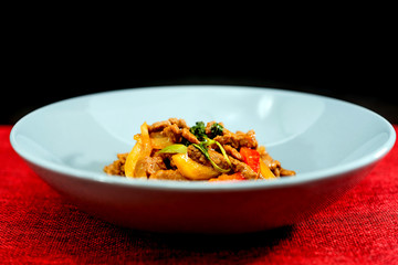 wok fried beef stir fry with sweet peppers and chinese vegetables