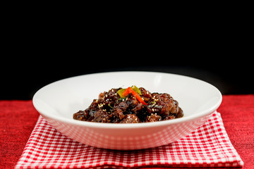 wok fried pork stir fry with sweet peppers and chinese vegetables