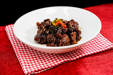 wok fried pork stir fry with sweet peppers and chinese vegetables