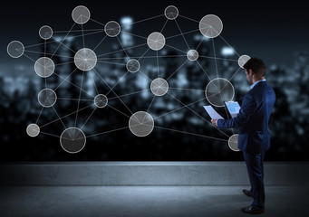 Businessman watching social network interface on a rooftop 3D rendering